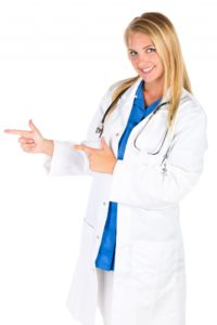 blonde female doctor pointing with both hands
